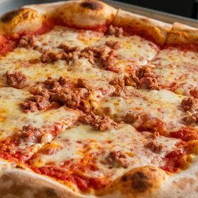 Quick and tasty school pizza slices ready to be enjoyed by hungry students.