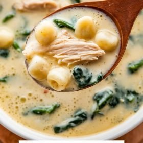 Easy-to-make Olive Garden chicken gnocchi soup served with garlic bread on the side