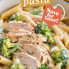 Delicious chicken and broccoli pasta served in a bowl with a sprinkle of freshly ground black pepper.